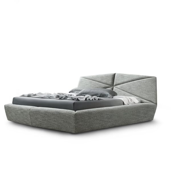 A large bed with headboard and contemporary finish