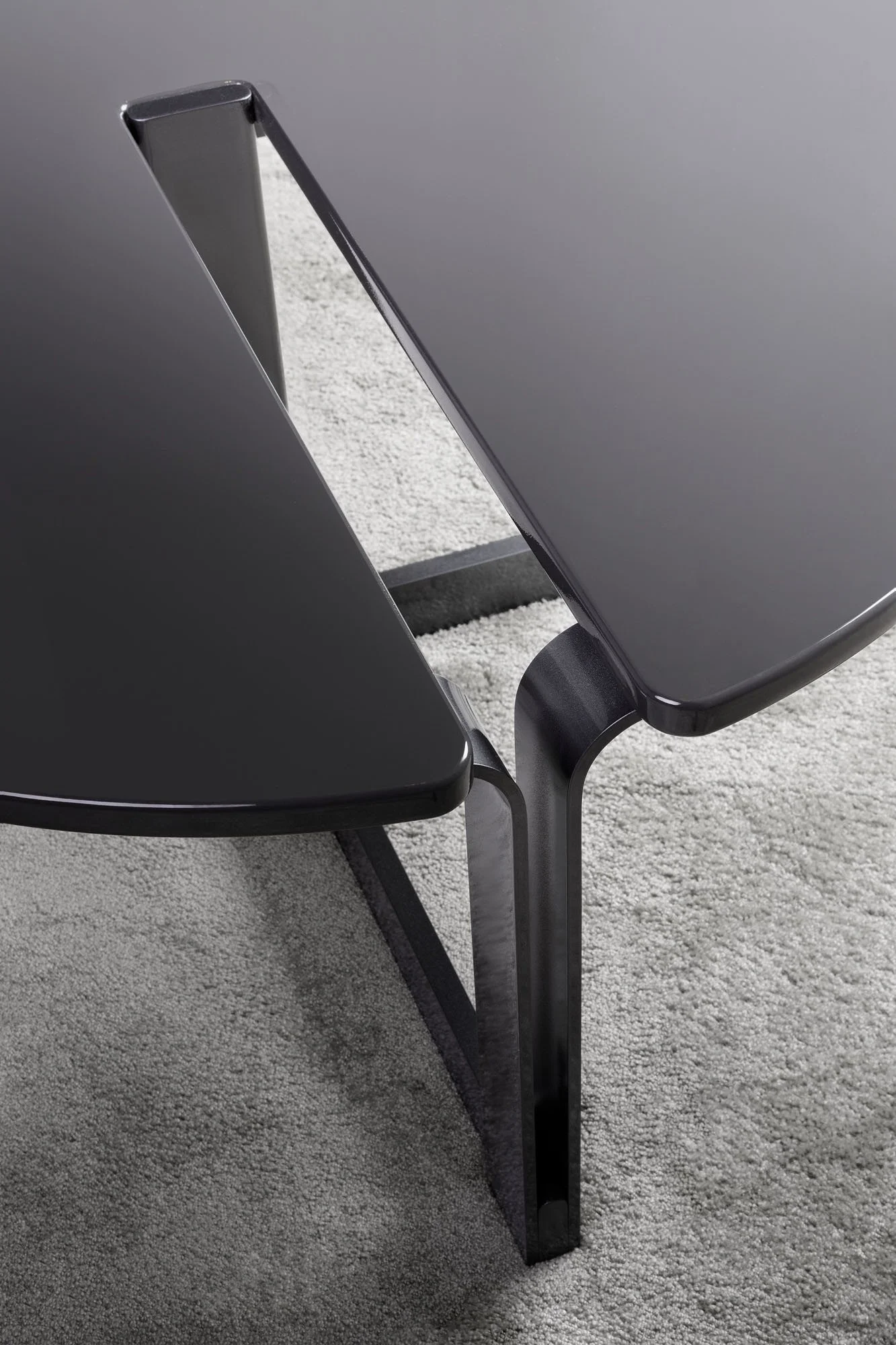 The Cut-Out Coffee Table is a stunning and innovative piece that combines modern design with functional elements.
