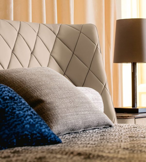 The Diamondback bed - featuring a stunning diamond-stitched headboard and a comfortable, plush mattress, this bed is the epitome of luxury