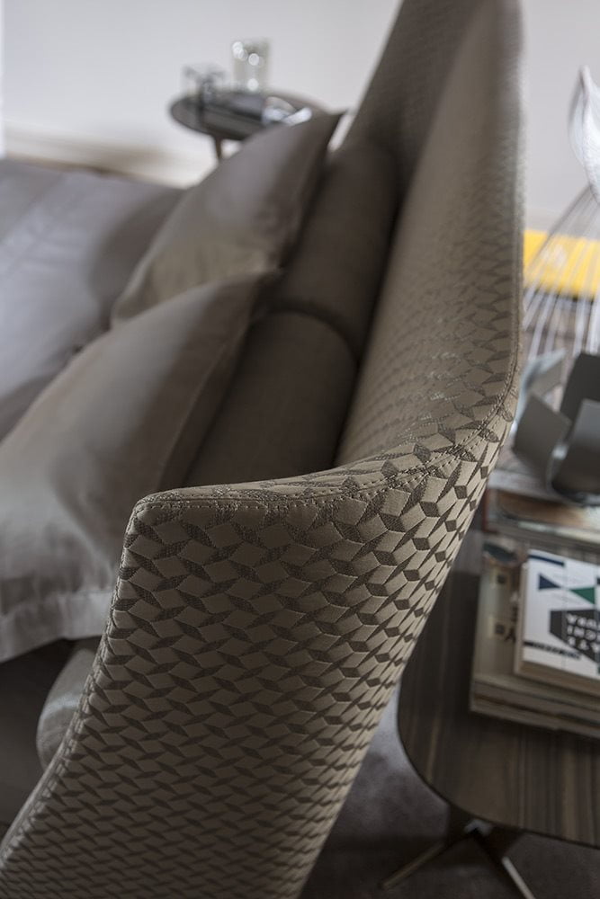The high headboard of the Serenity Bed provides a cozy and secure feeling, perfect for a peaceful night's sleep