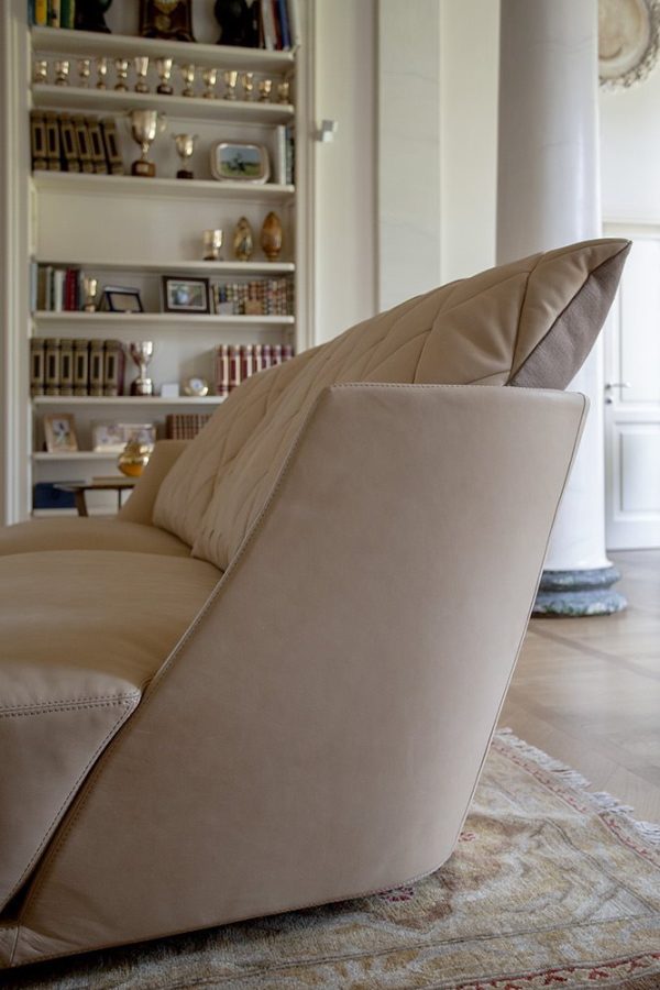With its clean lines and expertly crafted stitched cushions, this luxury modern sofa is the epitome of modern elegance