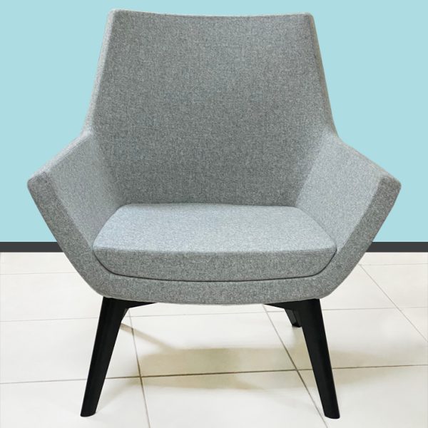 armchair, boasting a sophisticated geometric pattern that amplifies contemporary style.
