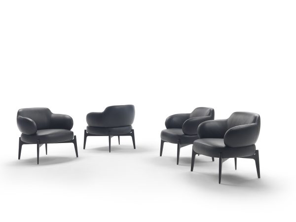 armchair on legs, a fusion of art and comfort.