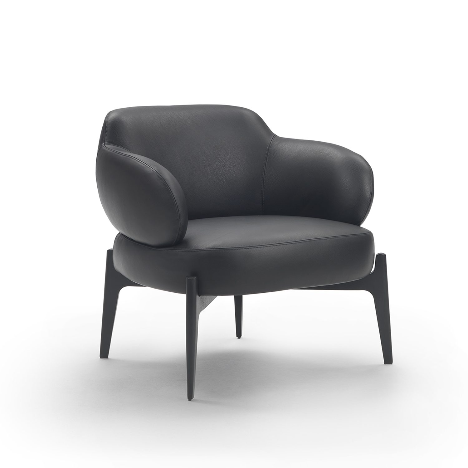 armchair, resting elegantly on its legs.
