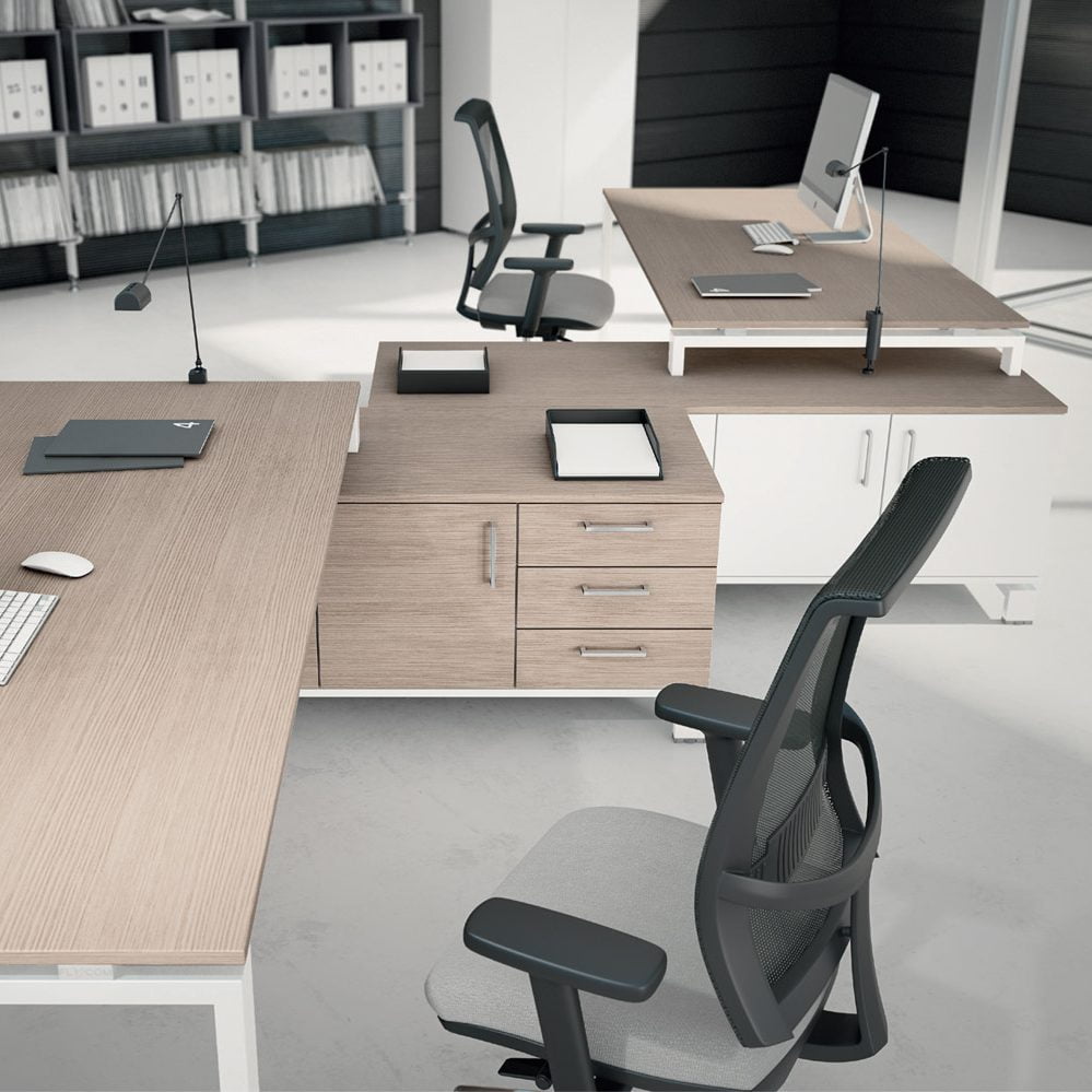 A large L-shaped desk with plenty of storage and work space
