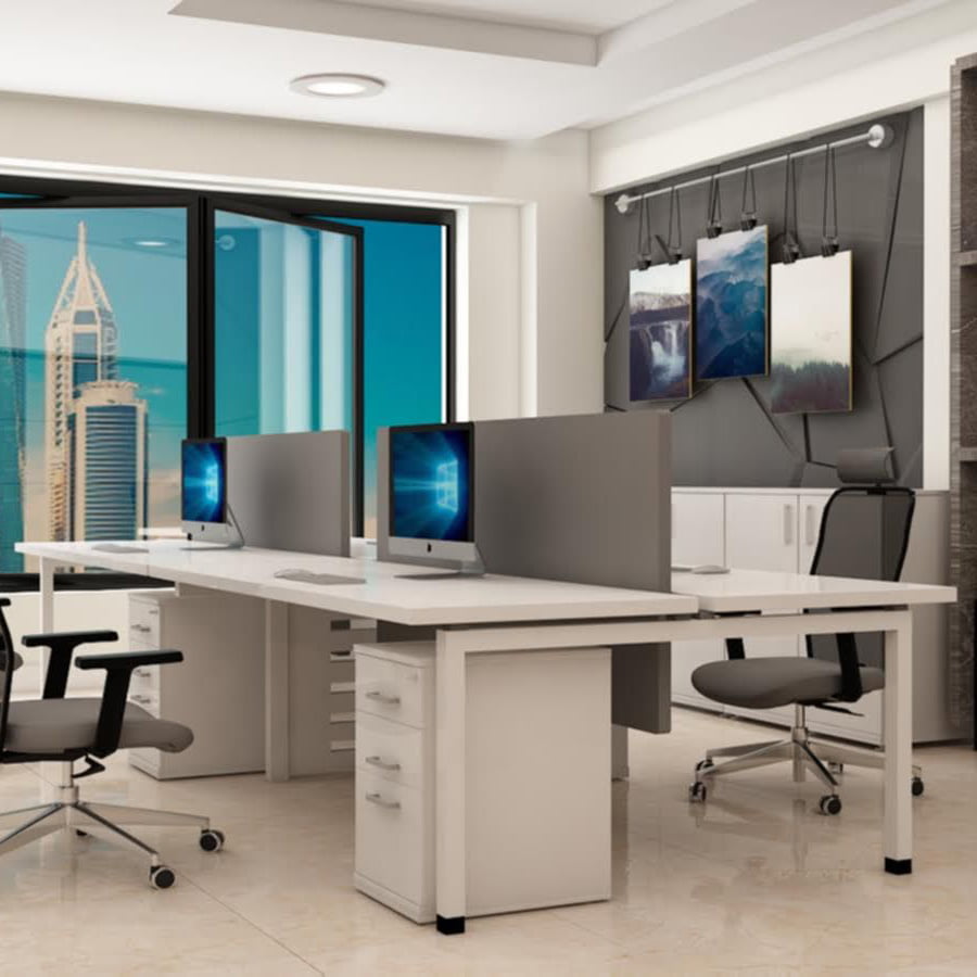 Efficient desk configuration for a quartet of professionals.