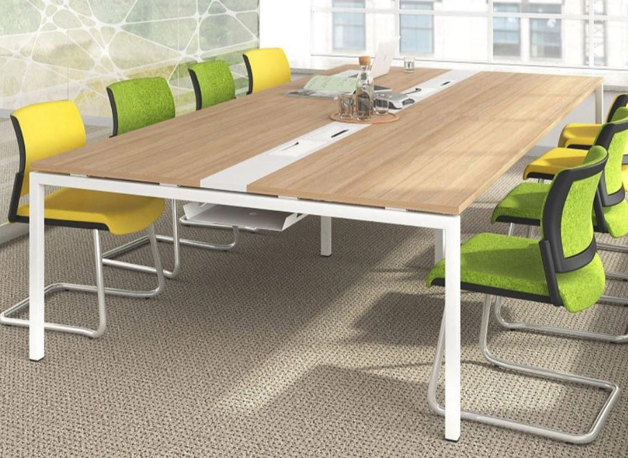 minimalist meeting table features a slim tabletop that maximizes workspace while maintaining an elegant and unobtrusive presence