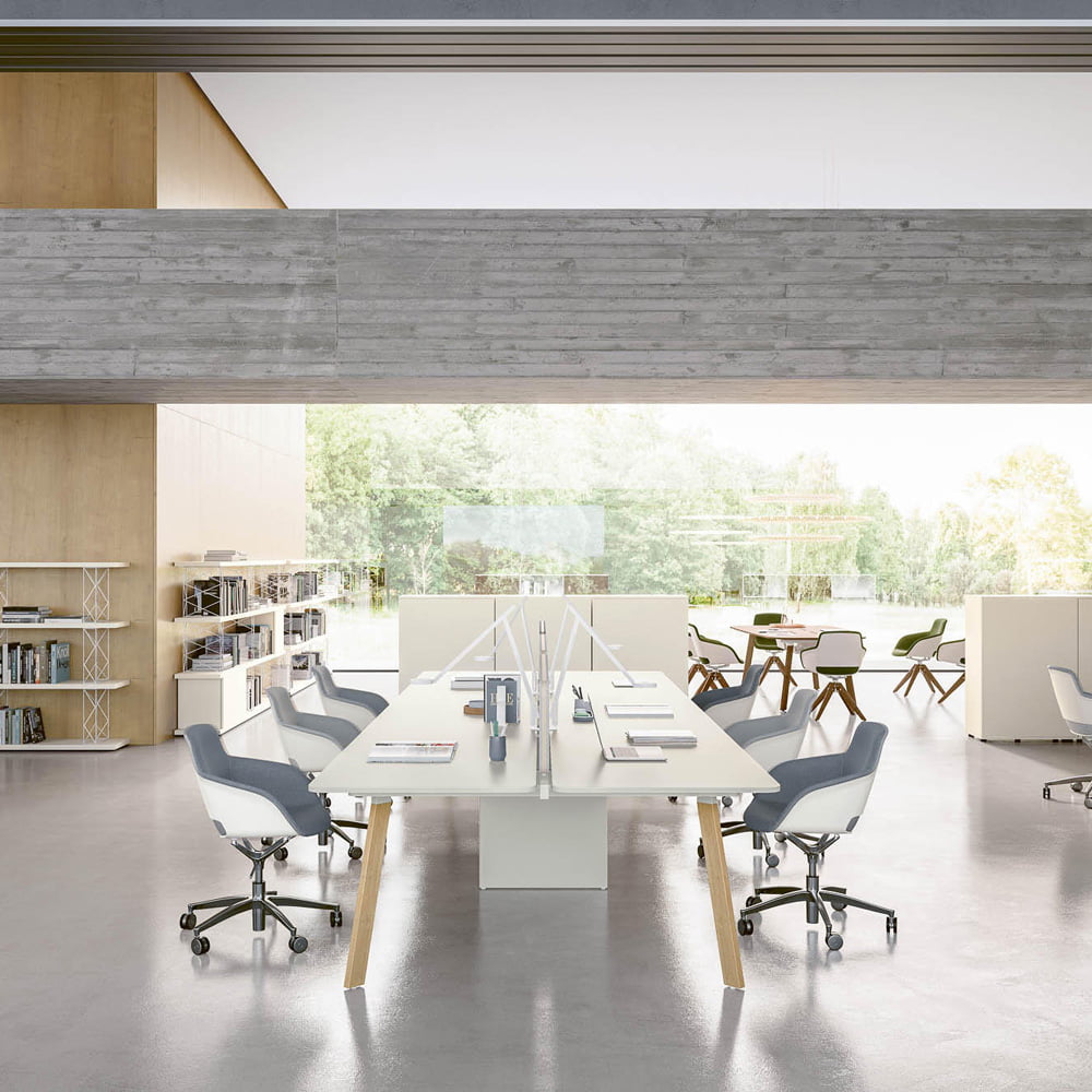 A modern office with open layout with a desk system