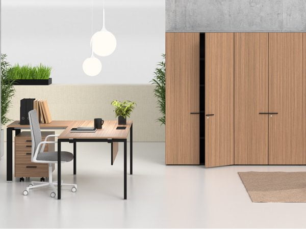 An executive desk with a built-in hutch, offering additional storage and display space for managers.