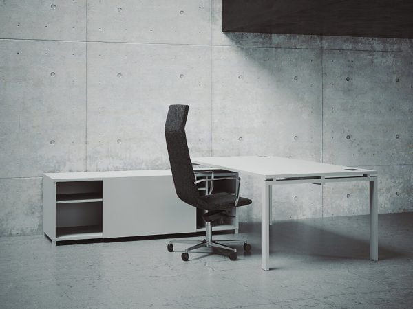 An office desk with built-in cable management, ensuring a tidy and organized workspace for managers