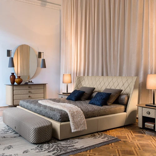 Bed with night side tables and a chest of drawers