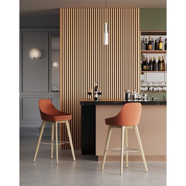 Comfortable high stool with a moulded foam seat and wood-reinforced upholstery.